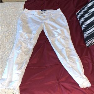 White, ripped jeans.